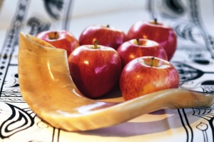 Shofar horn for Rosh Hashanah near apples